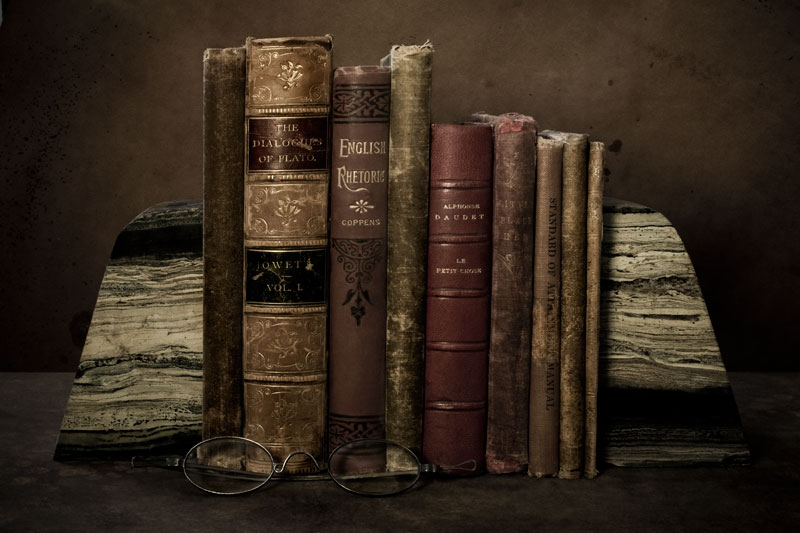 Nine Old Books in a Row (Row and Number Series)