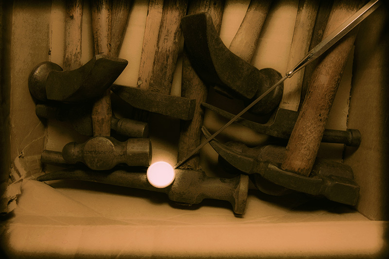 Glowing Mirror Among the Hammers